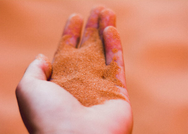 sand in hand